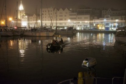 St. Peter Port met wat flarden mist